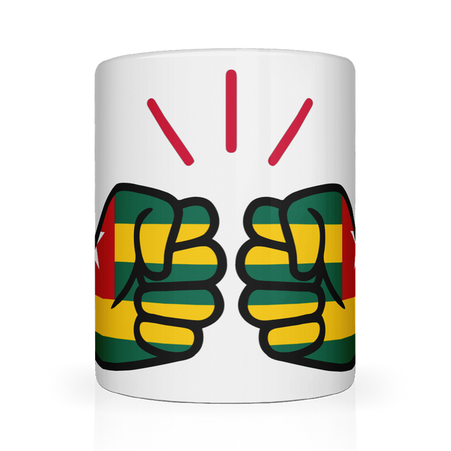 White ceramic mug featuring a bold “We Run Tings” design with two raised fists wrapped in the Togo flag colors, accented by red graphic lines above, symbolizing strength, unity, and cultural pride.