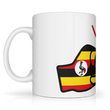 White ceramic mug from the We Run Tings brand featuring the Uganda flag design on a white background. Side view