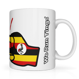 White glossy ceramic mug with Uganda flag design and 'We Run Things' text on a white background. Side view