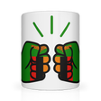 A white We Run Tings, Zambia ceramic mug with a graphic design of a fist holding a tea bag, surrounded by a green and red pattern. Front view