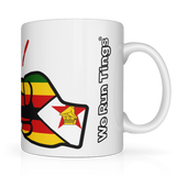 White glossy ceramic We Run Tings, Zimbabwe mug with a colorful design and 'We Run Tings' text on the side on a white background