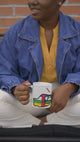 Video presenting a woman holding a We Run Tings Central African Republic (CAR) Mug